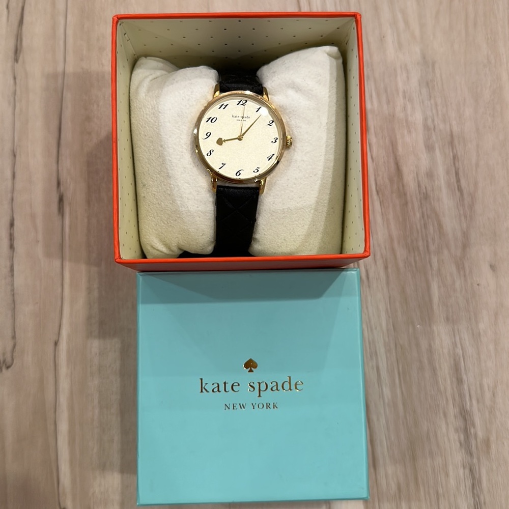 Kate spade watch. Black band with gold face.